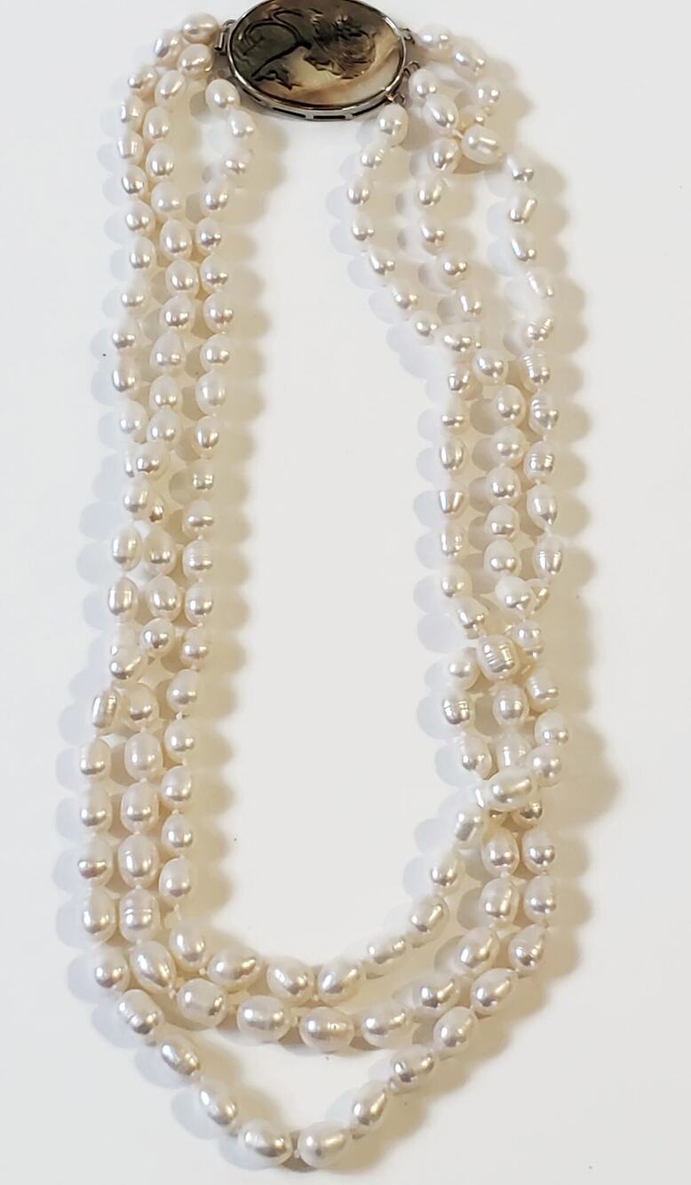 Triple Strand Freshwater Potato Pearl Necklace With Carved Shell Cameo Clasp
